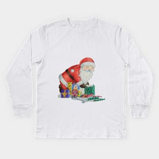 Cute santa with toys wrapping gifts for christmas Kids Long Sleeve T-Shirt